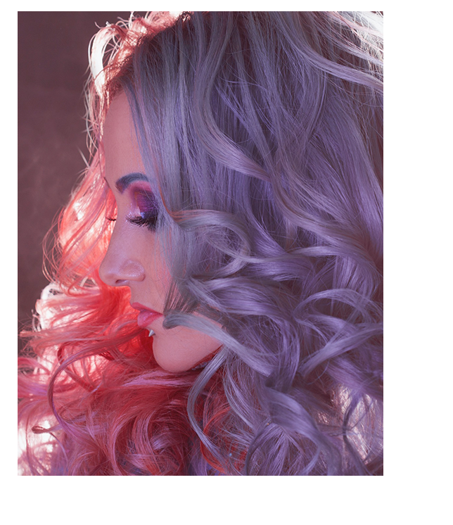 Woman with pastel-pink hair